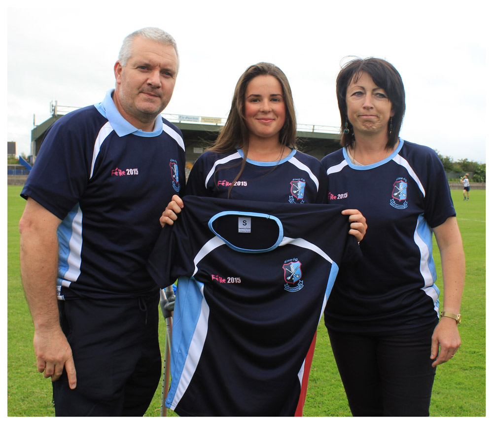 manager Mike Hallinan, captain Katie Morris and chairperson Denise Morris